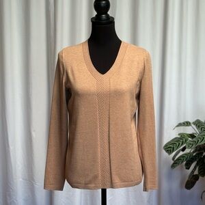 Talbots tan knitted long sleeve sweater. Size small. Detail at v-neckline, front